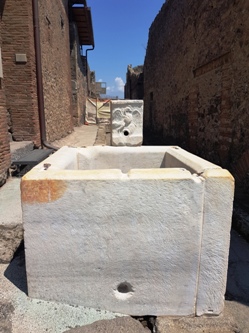 <b>One of the many fountains along Pompeii ruins streets</b>